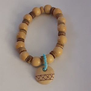 Simple wooden beaded bracelet natural tones stretch